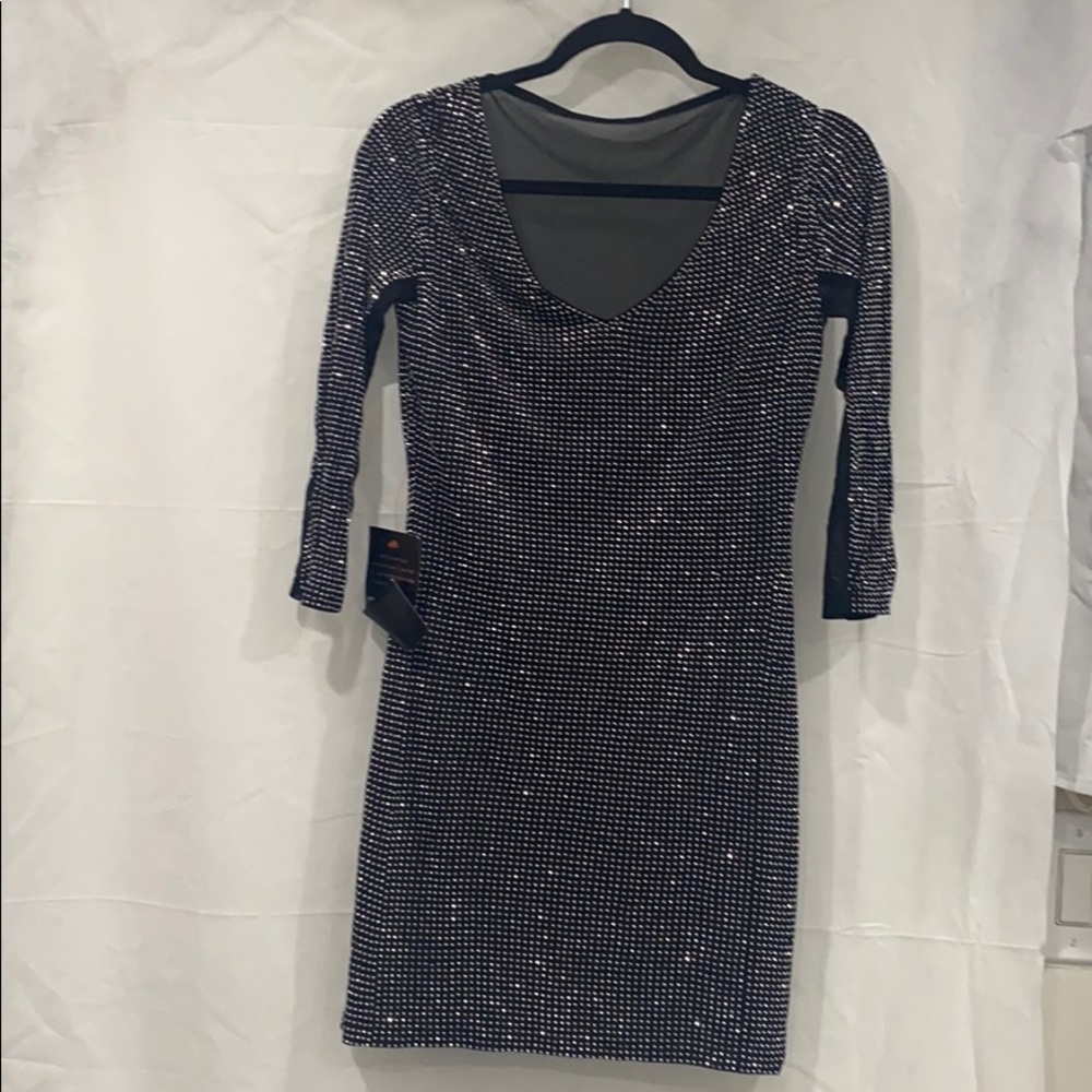 Brand New Bebe Dress with tag on.